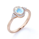 Vintage 1.50 Carat Oval Cut Blue Moonstone and Diamond Halo Engagement Ring in White Gold