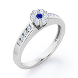 Clustered 1 carat Round Petite Blue Sapphire and Moissanites Channel Engagement Ring in White Gold