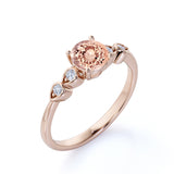 Four Prong Set 1.15 Carat Round Cut Morganite and Four Stone Diamond Engagement Ring in Rose Gold