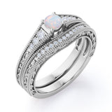 Tapered Four Prong Beaded 1.25 Carat Round Cut Ethiopian Opal And Diamond Vintage Art Deco Wedding Ring Set In White Gold
