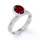 Classic Infinity 1.50 Carat Oval Cut Ruby and Diamond Halo Wedding Set in White Gold