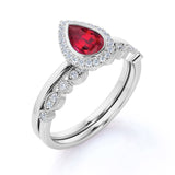 Timeless Milgrain 1.50 Carat Pear Cut Lab Ruby and Diamond Halo Wedding Ring Set in White Gold