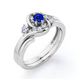 6 Prong Tension Design - 0.55 TCW Round Shaped Blue Sapphire and Moissanite - Flush Chanel Wedding Ring Set - White Gold