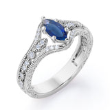 Beaded Framed 1.25 Carat Marquise Cut Sapphire And Diamond Vintage Filigree Engagement Ring In Rose Gold