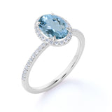 1.25 Carat oval cut Aquamarine and Diamond Halo Wedding Ring in Rose Gold