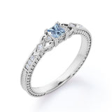 1.10 Carat Princess Cut Aquamarine And Diamond Vintage Milgrain Engagement Ring In White Gold.