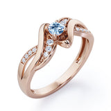 Distorted Unique Twisted Rope 0.6 carat Round Aquamarine and Moissanites Promise Ring in White Gold