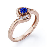 Whirly Gemstone 0.55 carat Round Blue Sapphire and Moissanites Artistic Engagement Ring in White Gold