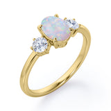 Three Stone 1.1 Ct Oval Cut Lab Created Opal Engagement Ring