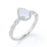 Twisted 1.45 Ct Pear Cut Lab Created Opal Engagement Ring