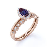 Antique Art Deco 1.50 Carat Pear Cut Lab Alexandrite and Diamond Halo Bridal Set Rings