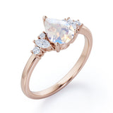 Fashionable 7 Stones 0.6 carat Pear Moonstone and Diamond Engagement Ring in White Gold