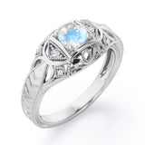 Seven Stone 1.05 Carat Round Cut Moonstone And Diamond Vintage Filigree Engagement Ring In White Gold