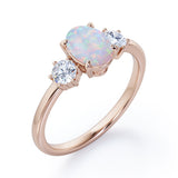 Three Stone 1.1 Ct Oval Cut Lab Created Opal Engagement Ring