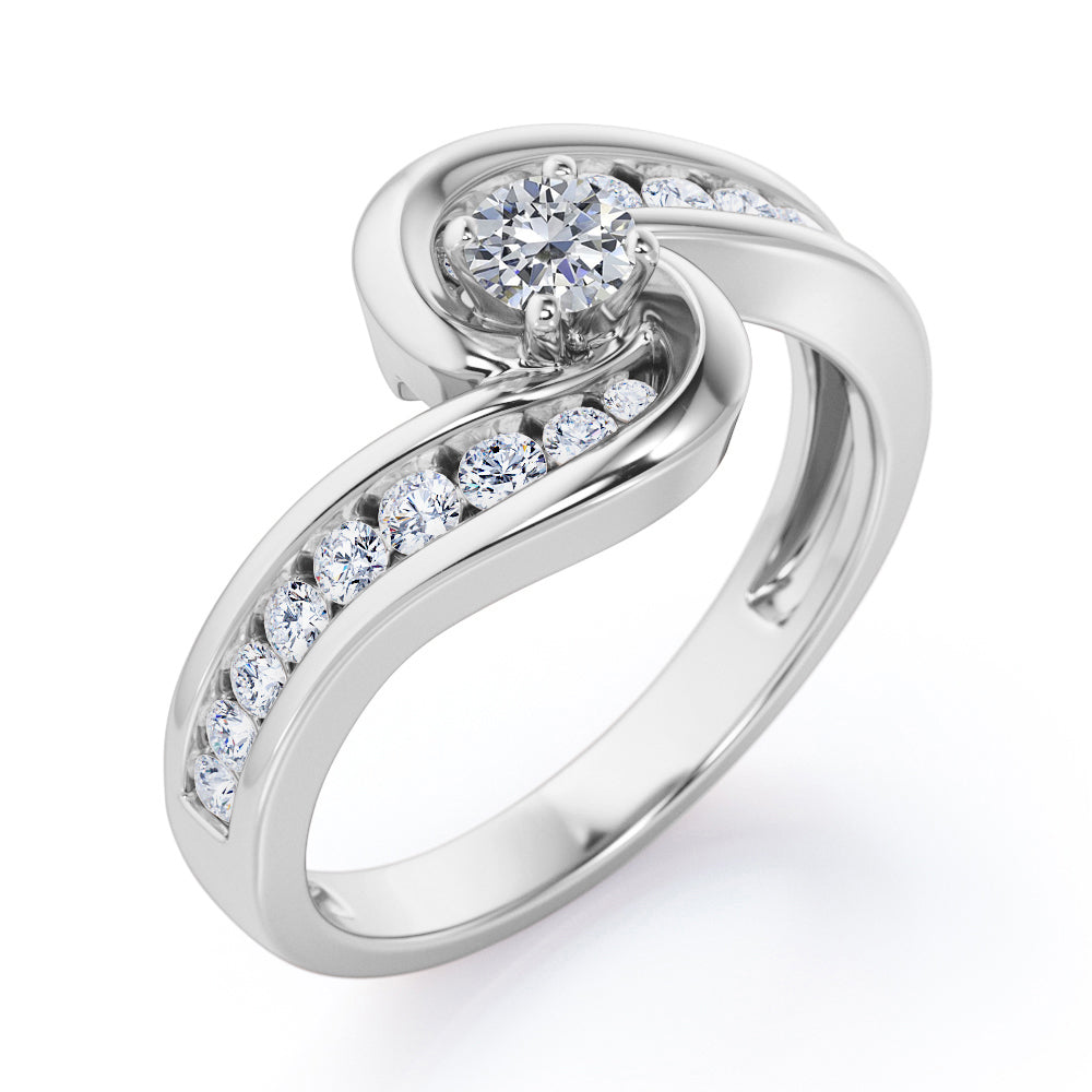 Spinning 0.7 carat Round Moissanite and Diamond Channel Engagement Ring in Yellow Gold