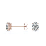Certified 4 Prong 4 Carat Oval Cut Moissanite Solitaire Stud Earrings In 18K Rose Gold Plating Over Silver