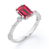Sharp Eight Claws 1.10 Carat Emerald Cut Ruby And Diamond Beaded Engagement Ring In White Gold