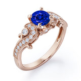 Four Prong 1.35 Carat Round Cut Sapphire and Diamond Vintage Milgrain Engagement Ring In Rose Gold