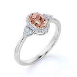 Four Prong 1.15 Carat Oval Cut Morganite and Six Stone Diamond Engagement Ring in Rose Gold