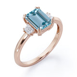 Eight Prongs 1.10 Carat Emerald Cut Aquamarine And Diamond Three Stone Engagement Ring In Rose Gold