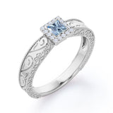 1.10 Carat Princess Cut Aquamarine And Diamond Halo Engagement Ring In White Gold
