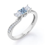 Scale Bridge Accent 0.65 carat Princess Aquamarine and Moissanite Twisted Wave Engagement Ring in Rose Gold