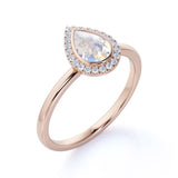 Classic 1.25 Carat Pear Shape Rainbow Moonstone and Diamond Halo Engagement Ring in Rose Gold