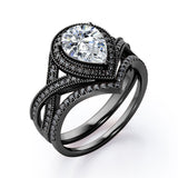 Milgrain Halo-Style 1.75 TCW Pear Cut Moissanite with Lab Created Black Diamond Pave Channel Wedding Ring Set in Black Gold