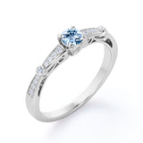 1.10 Carat Round Cut Aquamarine And Diamond Channel Set Engagement Ring In White Gold
