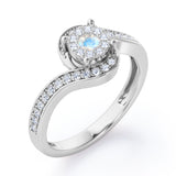 Wrapped Round 0.65 carat Round Moonstone and Moissanites Bypass Engagement Ring in Rose Gold