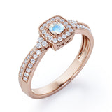 Double Pave Channel 1.5 Carat Round-Shaped Moonstone and diamond Halo Cluster Engagement Ring in Rose Gold