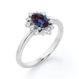 Hexagon Halo 1.20 Carat Oval Cut Lab Created Alexandrite And Diamond Bezel Set Four Prong Engagement Ring In White Gold