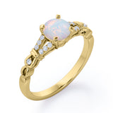 Split Shank 0.6 carat Round Opal and Diamond Engagement Ring in Rose Gold