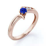 Curved Band - Six Prongs 0.5 carat Round Blue Sapphire and Moissanite Artistic Engagement Ring in Rose Gold