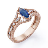 Beaded Framed 1.25 Carat Marquise Cut Sapphire And Diamond Vintage Filigree Engagement Ring In Rose Gold