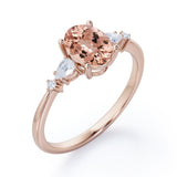 Classic Five Stone 0.6 carat Oval Morganite and Diamond Engagement Ring in Rose Gold