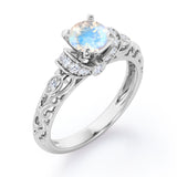 Modern Art Deco 1.15 Carat Round Cut Moonstone And Diamond  Four Prong Engagement Ring In White Gold