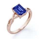 Solitaire 1 Carat Lab-Created Emerald Cut Sapphire Infinity Engagement Ring In White Gold