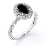Antique Art Deco 1.35 Carat Oval Cut Black Diamond Halo Engagement Ring In Black Gold