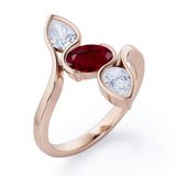 Distorted Line Three Stone 1 carat Oval and Pear Lab Ruby and moissanite Ring in Rose Gold