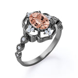 Colossal Flower 0.65 carat Oval Morganite and Moissanite Decorative Halo Engagement Ring in White Gold