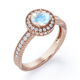 Decorative Halo 1 carat Round Moonstone and Diamond Milgrain Engagement Ring in White Gold