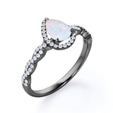 Twisted 1.45 Ct Pear Cut Lab Created Opal Engagement Ring