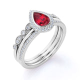 Elegant Pave 2.50 Carat Pear Shape Lab Ruby and Diamond Halo Trio Wedding Ring Set in White Gold