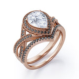 Milgrain Halo-Style 1.75 TCW Pear Cut Moissanite with Lab Created Black Diamond Pave Channel Wedding Ring Set in Black Gold