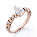 Vintage Style Scroll 0.5 carat Pear Moonstone and Diamond Engagement Ring in Rose Gold
