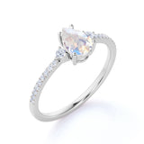 Surface Prong Set 1.50 Carat Pear White Blue Moonstone and Diamond Engagement Ring in Rose Gold