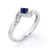 Twisted 7 Stone Ring - 0.55 carat Princess Blue Sapphire and Moissanite Elegant Engagement Ring in Rose Gold