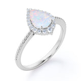 Vintage Inspired 1.35 Carat Tear Drop Fiery White Opal And Diamond Halo Engagement Ring In White Gold