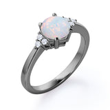 Seven Stone 1.25 Carat Round Cut Natural Opal And Diamond Tapered Engagement Ring In White Gold.